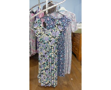 Vintage Fashion, Laura Ashley circa late 1970s/early 1980s: A black ground floral print cotton summer dress, the V neckline w