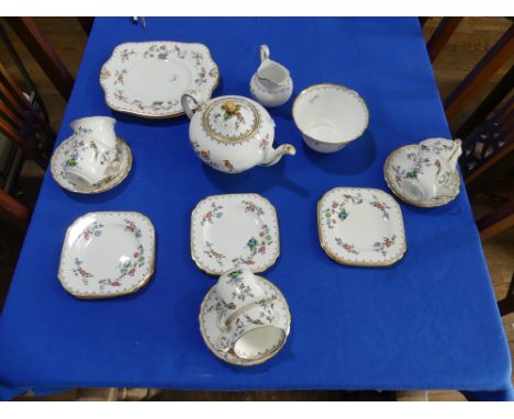 A mid 20thC 'Tuscan China' Tea Service, comprising six cups and saucers, six tea plates, one cracked, a teapot, cream jug and