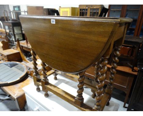     A Polished Oak Gate Leg Table                                                   