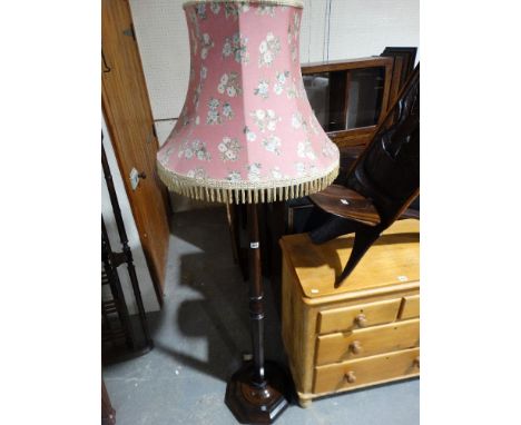     An Early 20th Century Polished Oak Standard Lamp                                