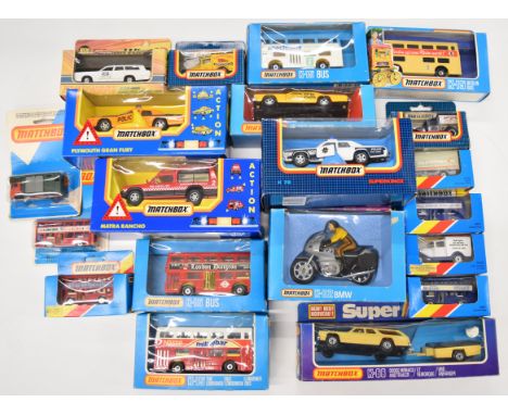 Twenty 1980's and early 90's Matchbox diecast model cars and buses to include Plymouth Taxi K-79, Dodge Monaco &amp; Trailer 