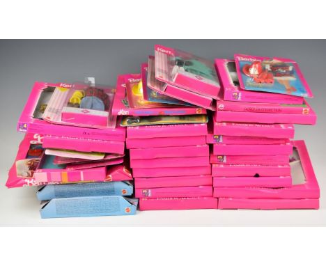 Thirty-five Mattel Barbie clothing and accessory sets, all in original packaging.