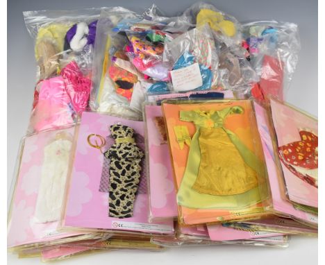 A quantity of fashion doll clothing including a selection of vintage outfits, Barbie, Sindy, Petra etc.
