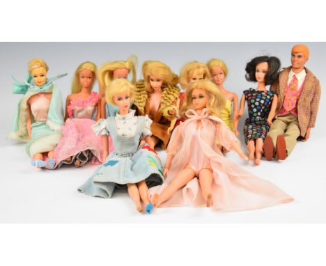 A collection of ten 1960's &amp; 1970's Mattel Barbie dolls including original vintage clothing, some visibly stamped Japan.