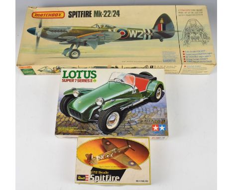 Three vintage plastic model kits comprising Matchbox PK-501 Spitfire Mk-22/24, Revell Spitfire H-50 and Tamiya Lotus Super 7 