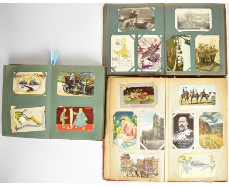 Three Edwardian postcard albums including topographical, humorous, transport and military, subjects include Cheltenham, Taunt
