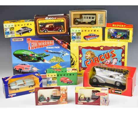 A collection of twenty-two diecast model cars including 1:18 scale Burago and 1980's Matchbox, all in original boxes.