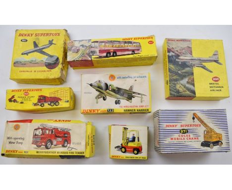 Eight vintage Dinky Toys diecast models in original boxes to include Vega Major Luxury Coach 952 and Merryweather Marquis Fir