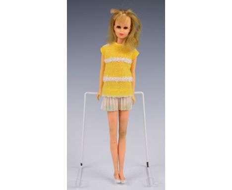 Barbie 'Francie' doll by Mattel with vintage yellow/white knitted dress and white shoes, c.1967, height 28cm.