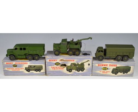 Three Dinky Toys diecast model military vehicles comprising 10-Ton Army Truck 622, Tank Transporter 660 and Medium Artillery 