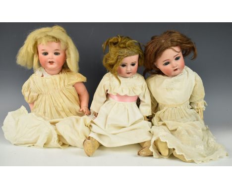 Three early 20th century bisque headed dolls comprising Simon &amp; Halbig / Kammer &amp; Reinhardt, SFBJ Paris and Armand Ma