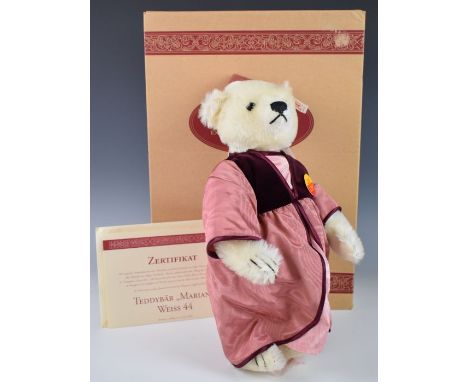 Steiff 1997 Marian Teddy bear with white mohair, growler, disc jointed limbs and rose/burgundy coloured dress, limited editio