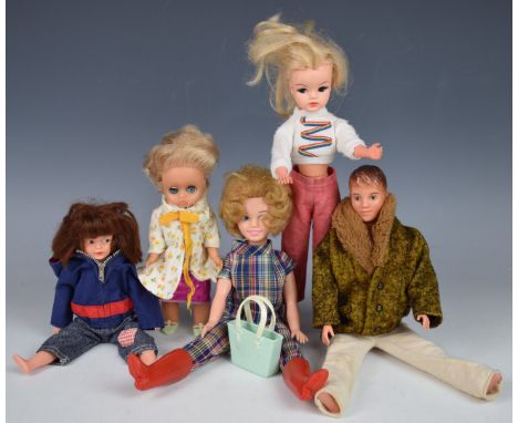 Four vintage Sindy dolls comprising Sindy, Paul, Patch and Vicki together with a collection of original clothing and an Amand
