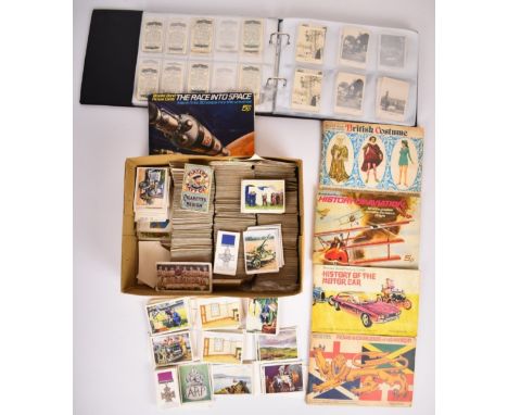 Cigarette cards in an album and loose including Cavanders, Army Club, Glorious Britain, coloured stereoscopic, Peeps into Man