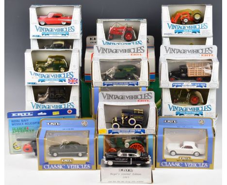 A collection of Ertl diecast vintage vehicles and tractors, in original boxes.
