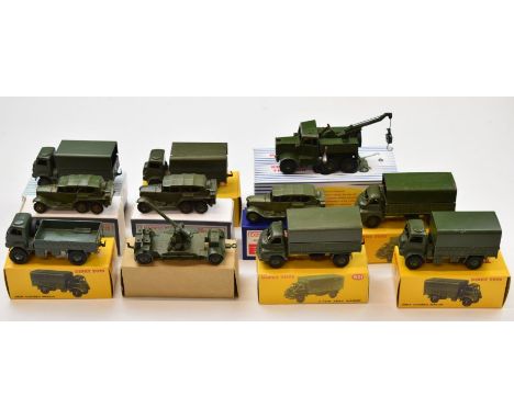 Eleven Dinky Toys diecast model military vehicles to include Army Covered Wagon 623, 3-Ton Army Wagon 621, Reconnaissance Car