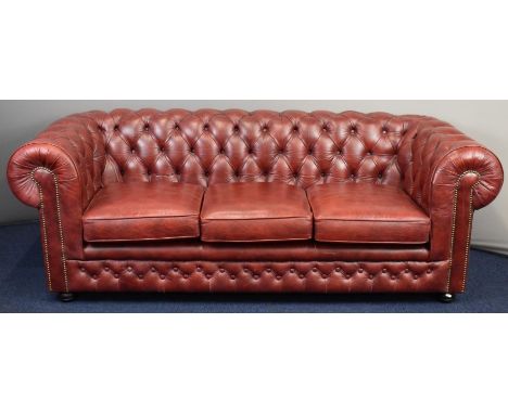 Thomas Lloyd red leather Chesterfield three seater sofa, length 206cm with Thomas Lloyd leather care kit