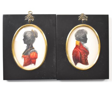 Pair of Turville silhouette portrait miniatures of a lady and gentleman with red clothing and gilt highlights, both signed, i