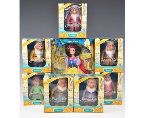 A full set of Mattel/Disney Snow White and the Seven Dwarfs dolls including Doc, Happy, Grumpy, Dopey etc, all in original bo