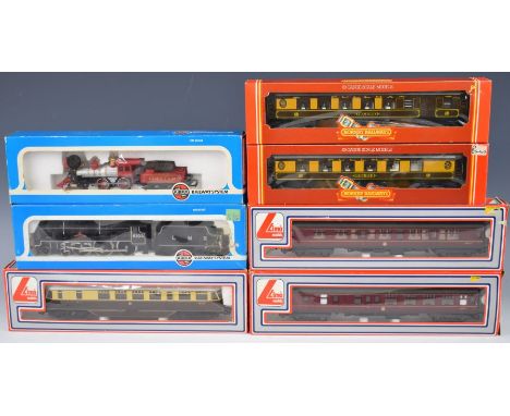 A small collection of 00 gauge model railway locomotives and carriages together with a single H0 scale locomotive. Hornby, Li