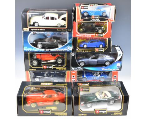 Eleven 1:18 and 1:24 scale diecast model sports cars by Burago, Hotwheels, Majorette etc to include Shelby Cobra (1964), Jagu