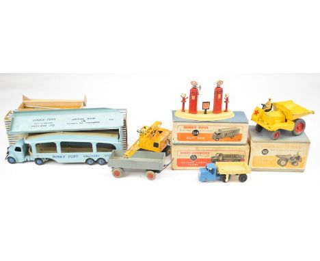 For vintage Dinky Toys diecast models comprising Guy Van 514, Dumper Truck 562, Coles Mobile Crane 571 and Pullmore Car Trans