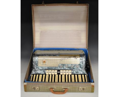 Marinucci 120 bass piano accordion with blue marbled finish, in fitted case