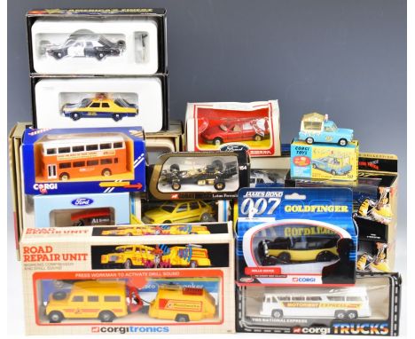 A collection of vintage and modern Corgi diecast model cars to include Ford Sierra 299, Walls Ice Cream Van original and repr