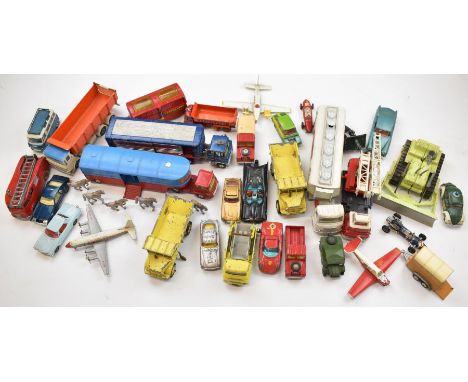 A collection of loose Corgi and Dinky diecast model vehicles to include James Bond Aston Martin DB5, Batmobile, Commer Bus 25