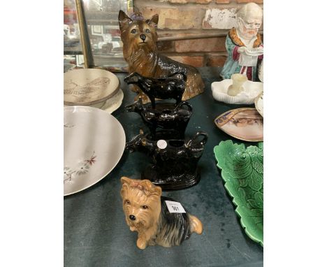 A LARGE YORKSHIRE TERRIER AND A SMALLER SYLVAC ONE, PLUS 3 VINTAGE COW CREAMERS - MISSING LIDS 