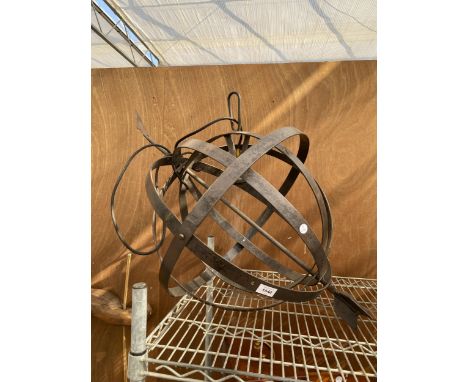 AN ARMILARY SPHERE LIGHT FITTING 