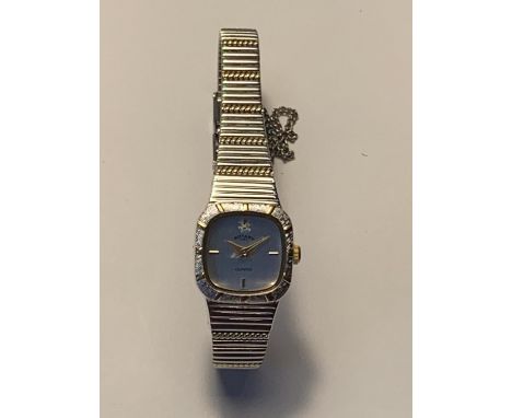 A ROTARY WHITE AND TELLOW METAL STRAP WRIST WATCH IN NEED OF BATTERY 