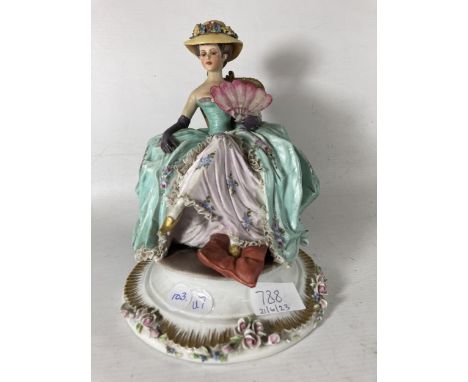 A VINTAGE CAPODIMONTE FIGURE OF A LADY AT REST 