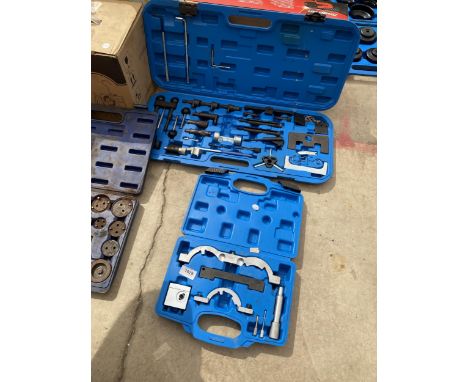 A CASED TIMING KIT AND A CASED ENGINE ADJUSTING KIT 