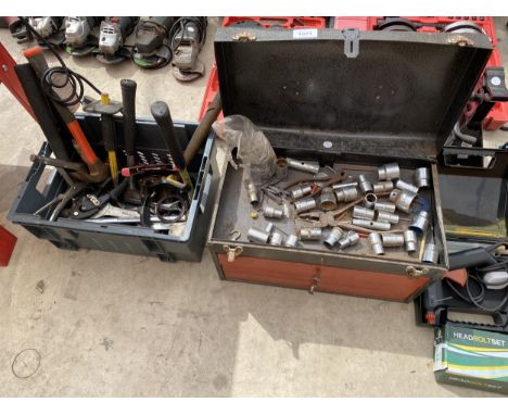 A METAL TOOL CHEST CONTAINING AN ASSORTMENT OF SOCKETS AND SPANNERS AND A FURTHER ASSORTMENT OF TOOLS TO INCLUDE HAMMERS AND 