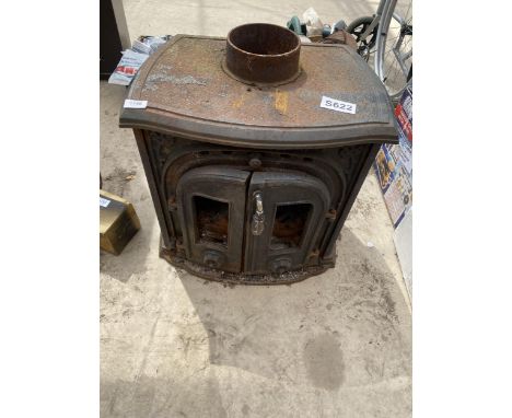 A VINTAGE CAST IRON LOG BURNER 