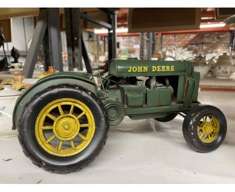 A TIN PLATE MODEL OF A 1931 JOHN DEERE TRACTOR 