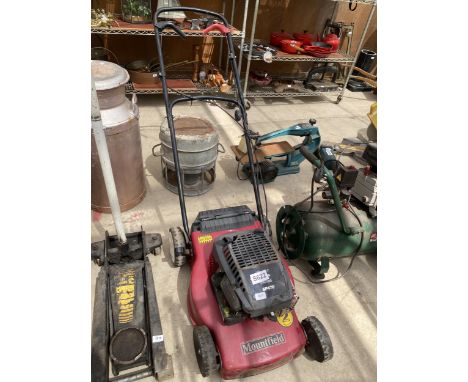 A MOUNTFIELD PETROL ENGINE LAWN MOWER LACKING THE GRASS BOX 