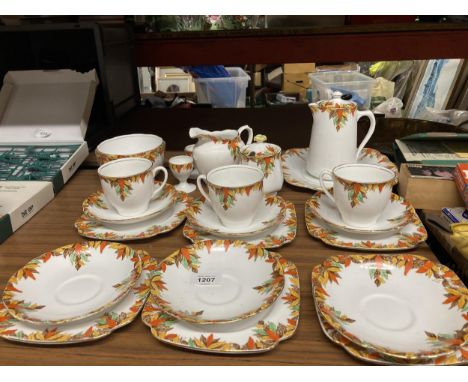 A VINTAGE BELL CHINA TEASET TO INCLUDE A CAKE PLATE, CREAM JUG, SUGAR BOWL, CUPS, SAUCERS, SIDE PLATES, ETC 