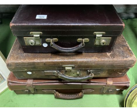 THREE VINTAGE LEATHER SUITCASES 