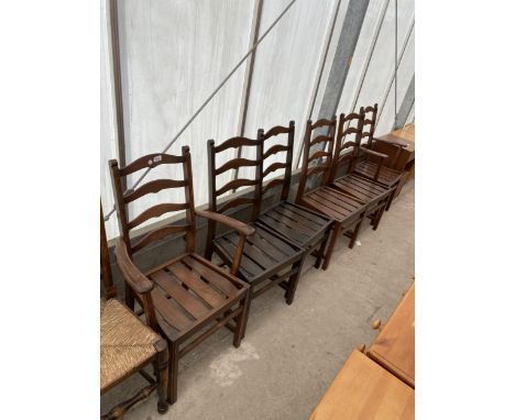 A SET OF SIX ELM AND BEECH ERCOL DINING CHAIRS, TWO BEING CARVERS 