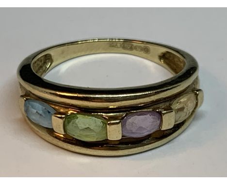 A 9 CARAT GOLD RING WITH FOUR IN LINE MULTI COLOURED GEMSTONES SIZE N/O 