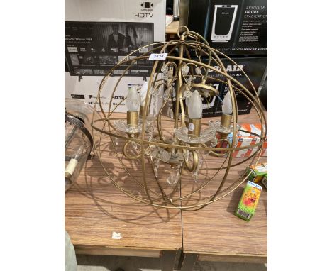 A DECORATIVE SPHERICAL METAL LIGHT FITTING 