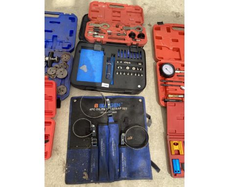AN ASSORTMENT OF TOOLS TO INCLUDE A TIMING GEAR REPAIR KIT ETC 