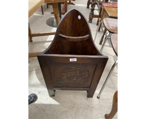 A MID 20TH CENTURY OAK CORNER STICK STAND WITH CARVED PANEL DEPICTING MASTED SHIP 