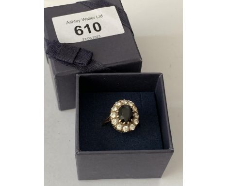 A 9 CARAT GOLD BLACK OPAL RING IN A PRESENTATION BOX 