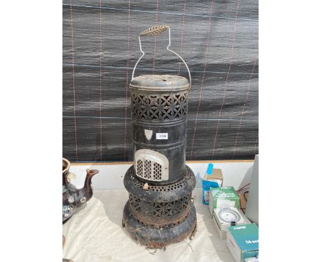 A VINTAGE METAL PARAFIN HEATER 