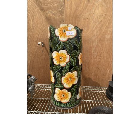 A METAL FLORAL STICK STAND 