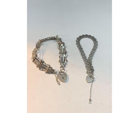 TWO SILVER GATE BRACELETS WITH HEART PADLOCKS 