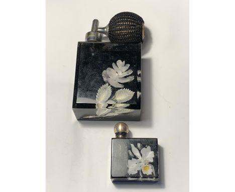 TWO VINTAGE PERFUME BOTTLES WITH ENCASED FLOWERS 